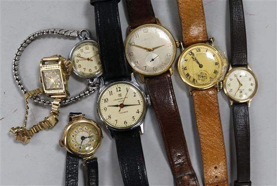 A group of wrist watches including two 9ct gold and one other yellow metal.